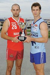 South Fremantle captain Ryan Cook and East Fremantle captain Mark McGough with the Sir Hughie Edwards Cup they will be playing for.