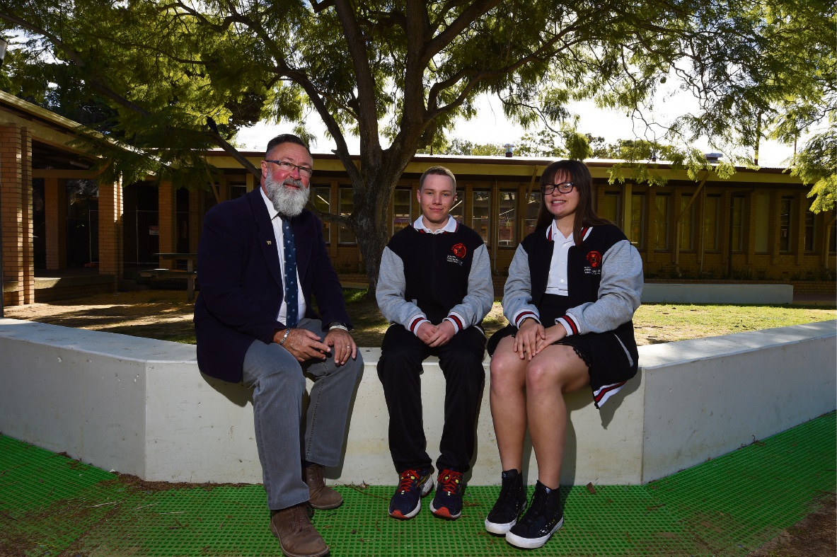Deputy principal Neil Wilson with head boy Jacob Buckland and head girl Harmony O'Connor.