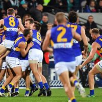 The Eagles players celebrate after the final siren after beating Port Adelaide on Saturday night. Picture: Daniel Kalisz/Getty Images