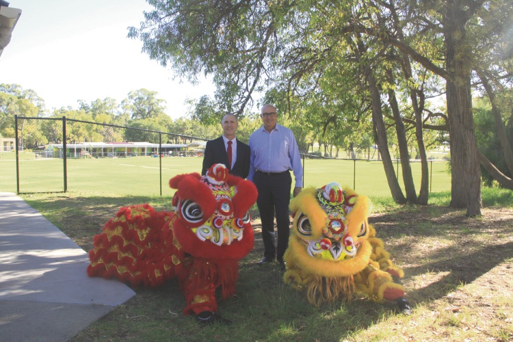 Calista Primary School principal Craig Skinner with Tianqi Lithium’s general manager Phil Thick and Lion dancers from Chow Kwoon Yarn Yee Tong Kung Fu Academy.