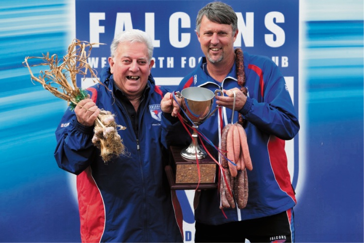 West Perth life member Joe Scarfo, who has been busy trying to resurrect the debt-troubled Falcons, and coach Bill Monaghan promoting the Garlic Munchers Cup in 2015. The annual clash with South Fremantle honours the clubs' rich European connections. Picture: Martin Kennealey
