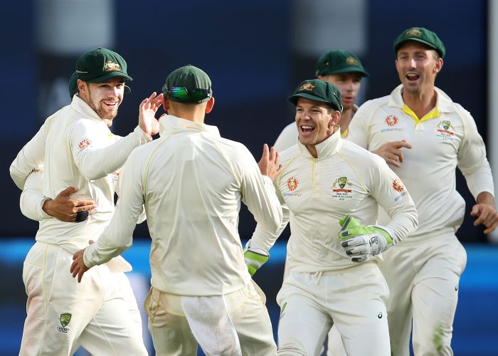 Australia's Travis Head celebrates catching Ajinkya Rahane of India off a delivery by team mate Josh Hazlewood on day four at Optus Stadium, Picture: Cameron Spencer/Getty Images