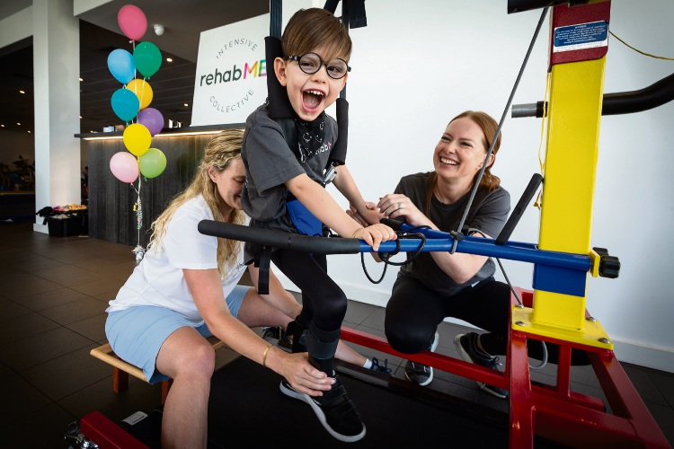 Pictured (L-R) Daisy Stirling (Physiotherapist), Owen Di Candilo,5, Taryn Di Candilo (Duncraig). Photo: Will Russell