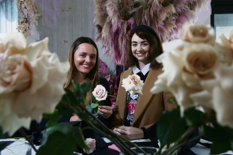Georgia Brennan (left) and Kate Esslemont of Sir Botanical, a florist based at Liv Apartments' pop-up hub specialising in arrangements for custom weddings, events and next-day deliveries. Picture: Andrew Ritchie
