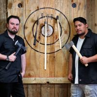 Maxed Out Axe Throwing owner Simon Gray and co-founder Lyric Erceg. Picture: David Baylis www.communitypix.com.au d495659