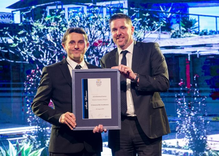 CLS Electrical’s Craig Strauch (left) receives the Domestic Residence title from Energy Super's Steve Scott at this year’s National Electrical and Communications Association’s WA Excellence Awards.
