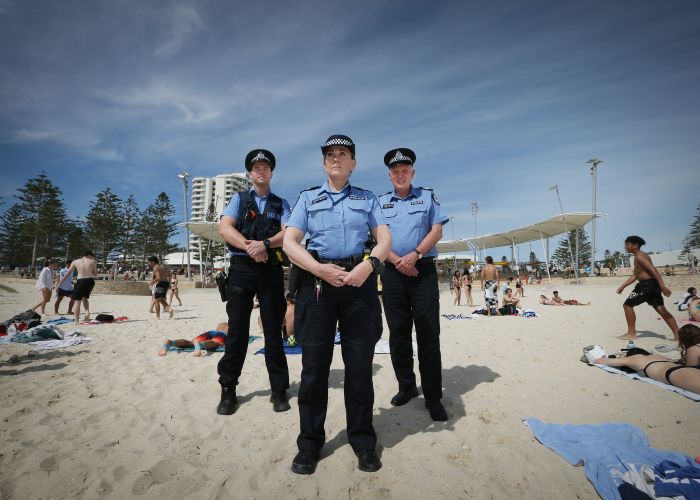 Scarborough Police Constable Josh Hills, Senior Constable Karyn Kersemakers and Senior Sergeant Craig Wanstall at Scarborough Beach. Photo: Andrew Ritchie