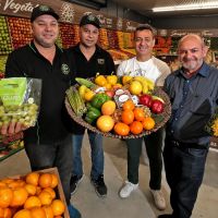 Family Fresh Growers Market fruit and veg manager Tom Saunders, fruit and veg buyer Cleve Saunders, owner Reinaldo Nunes and general manager Alberto Caeiro in their new store at Drovers Market Place in Wanneroo. Picture: David Baylis www.communitypix.com.au d496437