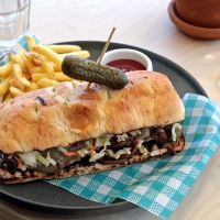 Brisket sandwich with pepper jack cheese, jalapeno, pickles, sriracha slaw, barbecue sauce, panini and fries at The Amberton Beach Bar and Kitchen. Pictures: David Baylis www.communitypix.com.au d496751