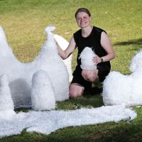 Elizabeth Marpole, of Greenwood, with her artwork entitled Fibre Falls for Sculpture by the Sea. Picture: David Baylis www.communitypix.com.au d498030