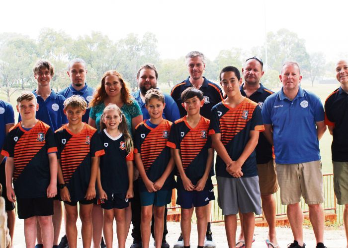 Kingsley MLA Jessica Stojkovski with members of the Kingsley Westside and Woodvale football clubs.