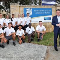 Emmanuel Christian Community School principal Gary Harris and Senator Dean Smith, with students from Year 8 to 12. Pictures: David Baylis www.communitypix.com.au d498138