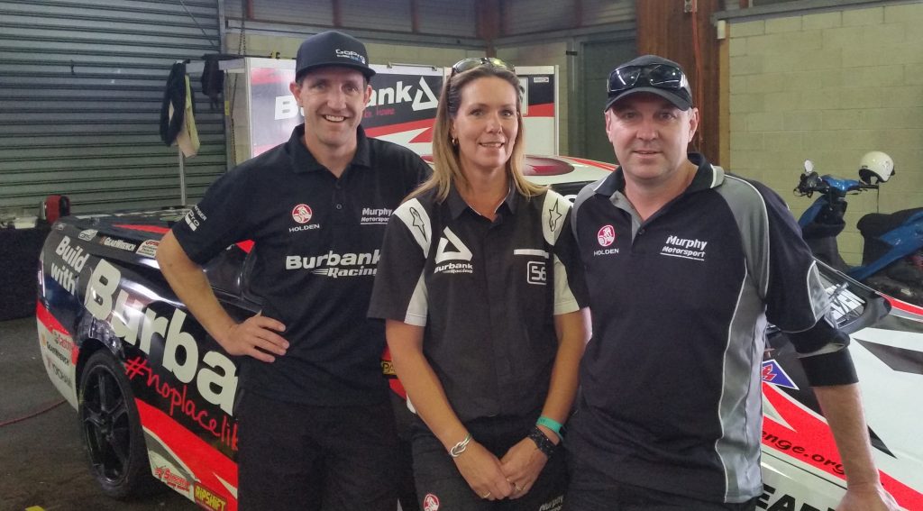 Nicole flanked by her brother Nathan and husband Dave