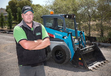 Skid-steer loader gets the job done for landscaper Skid-steer loader gets the job done for landscaper