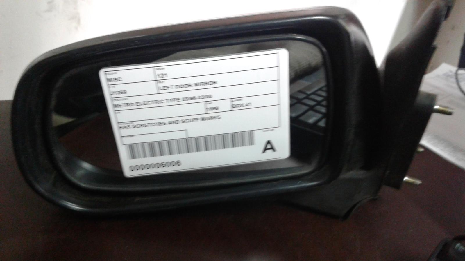 View Auto part Left Door Mirror Mazda 121 1999