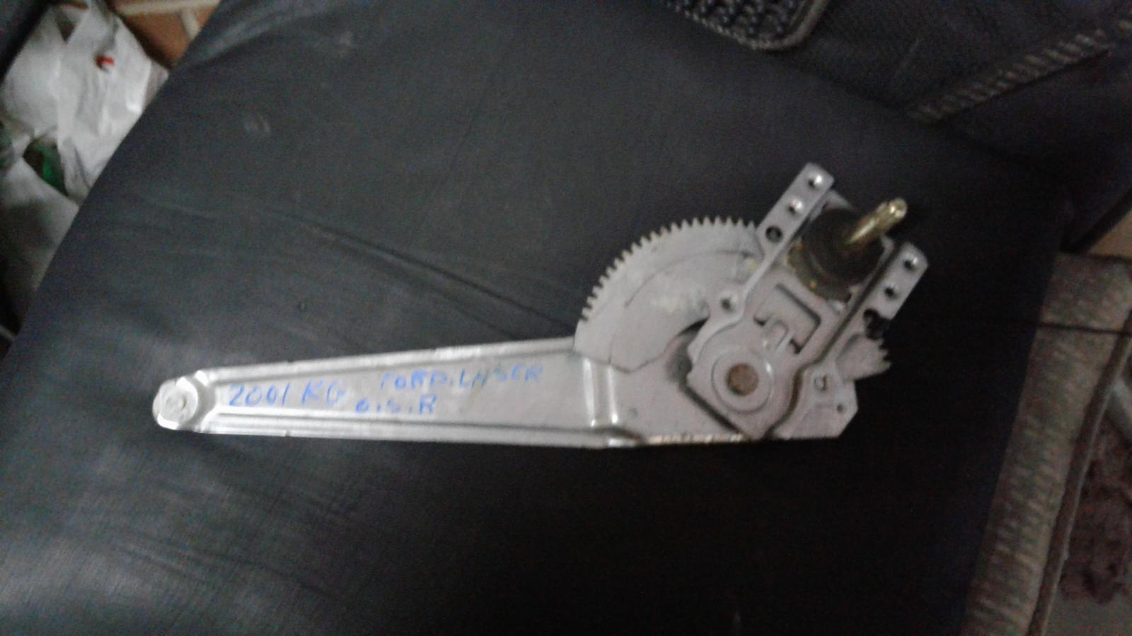 View Auto part Left Front Window Reg/Motor Ford Laser 2001