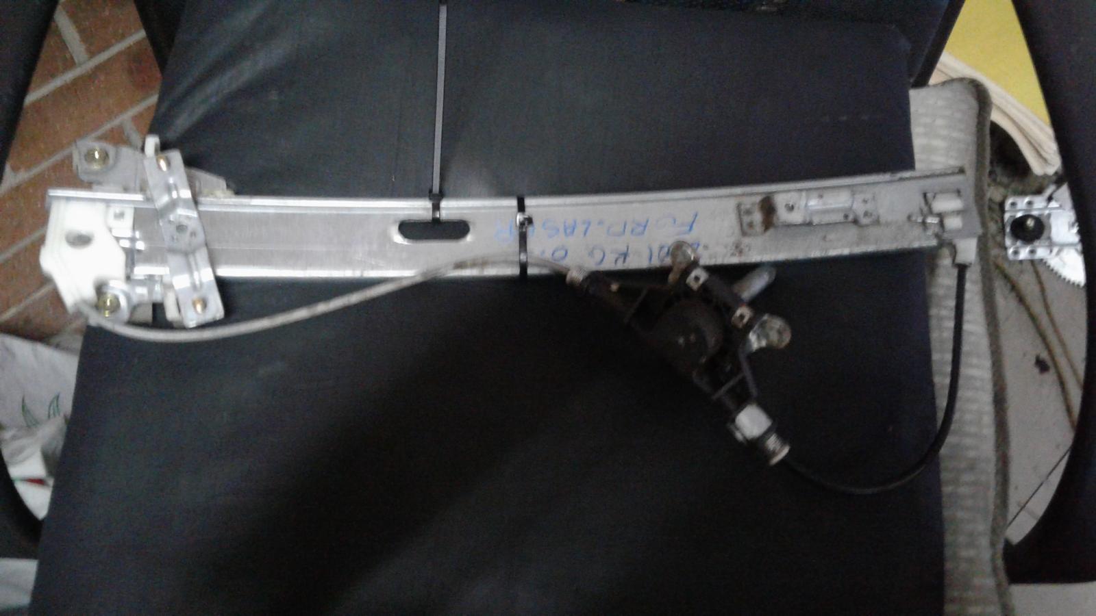 View Auto part Left Front Window Reg/Motor Ford Laser 2001