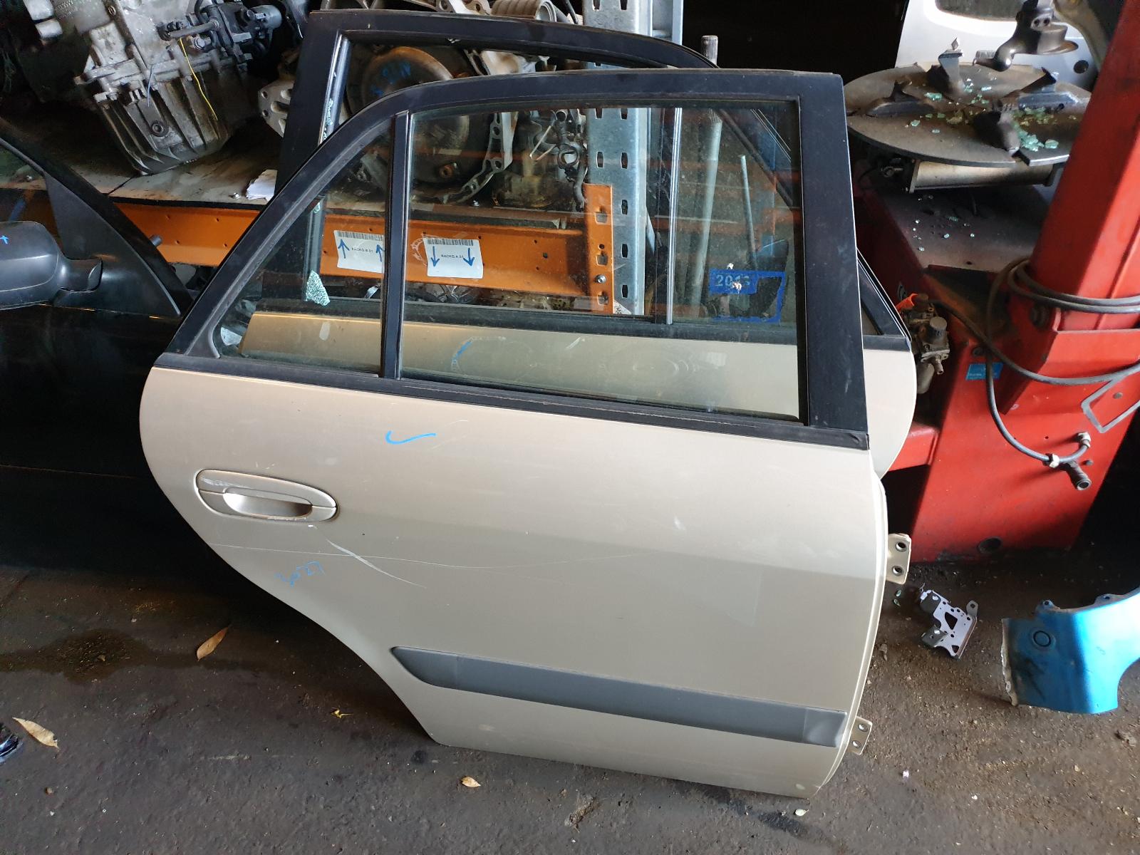 2001 Mazda 626 Right Rear Door Sliding View Auto part Right Rear Door Sliding Mazda 626 2001