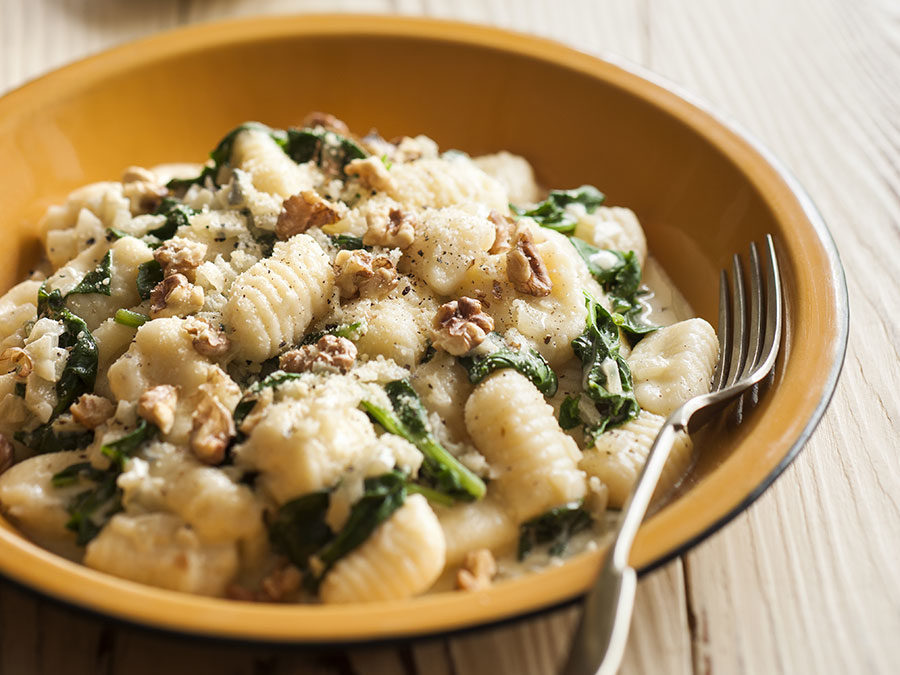 Potato and parmesan gnocchi with spinach, gorgonzola and toasted walnuts