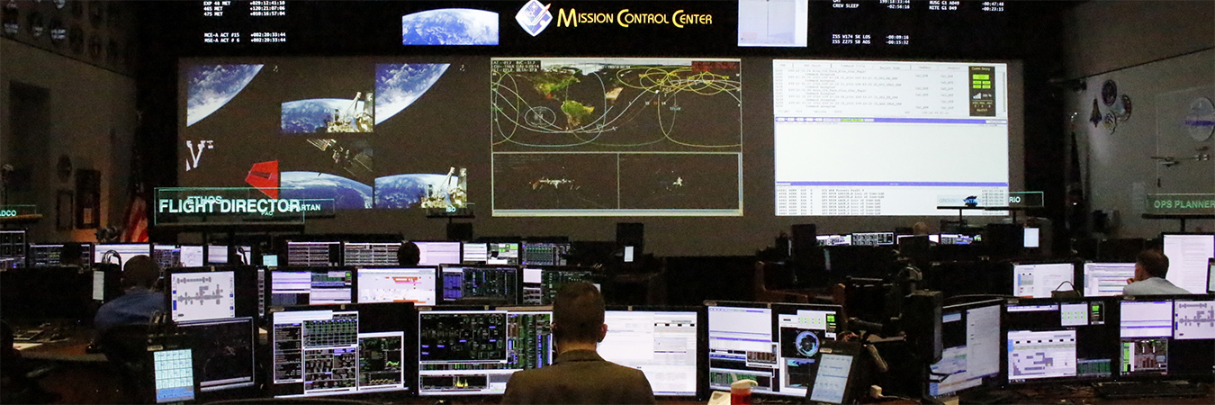 DigitalGovServices_JUL21-thumb. WikiMedia: https://en.wikipedia.org/wiki/File:International_Space_Station_Flight_Control_Room.jpg