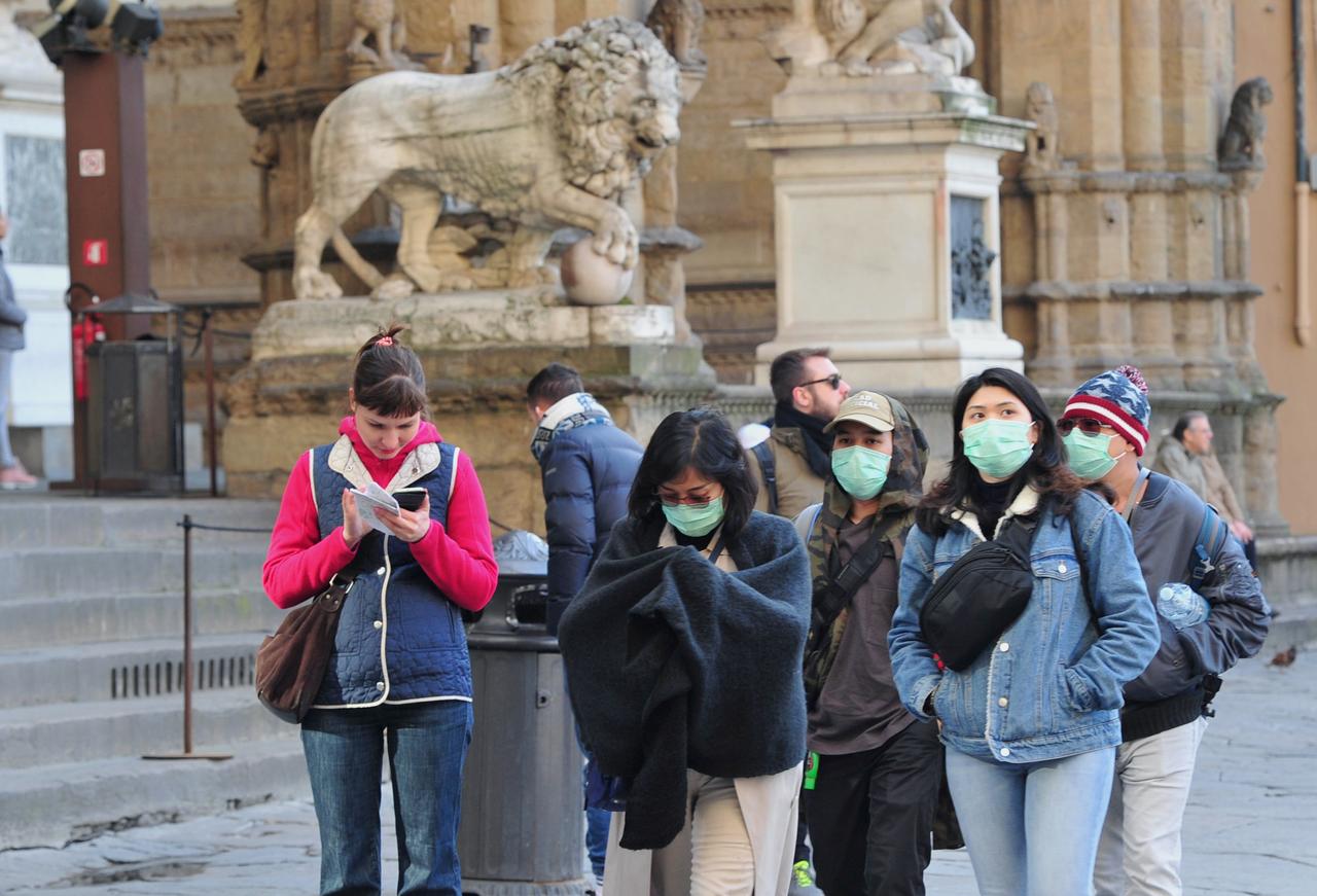 People wearing masks in Italy