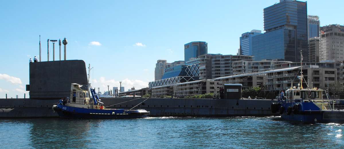 DMS tug boats moving Onslow through Darling Harbour