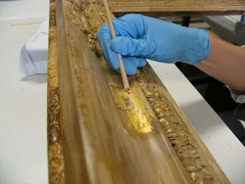 Area where gesso has been removed, revealing gold leaf.