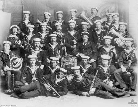 The HMVS Cerberus band in 1898. Underwood is moustached, leaning on the bass drum near the centre-right. Australian War Memorial 305343.