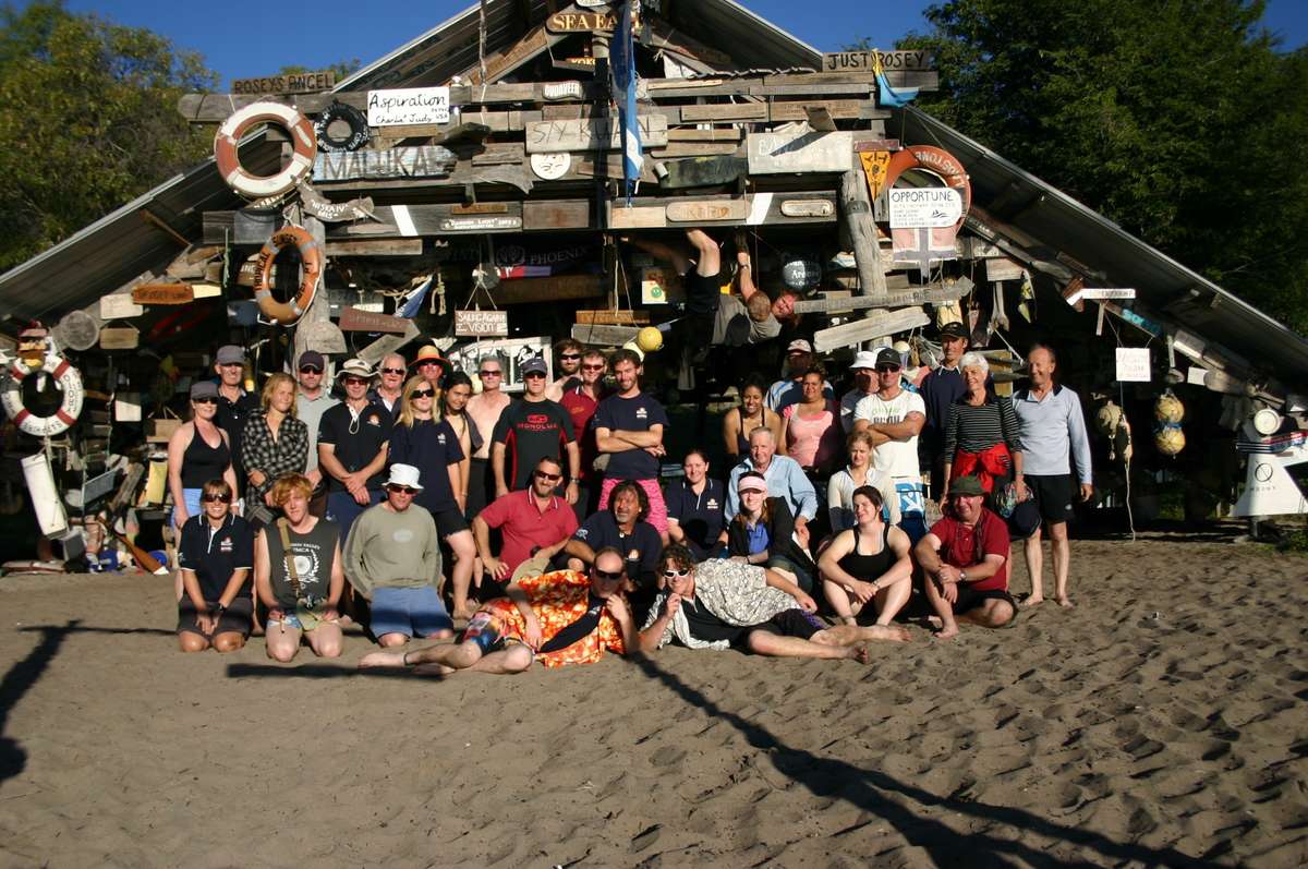 The crew outside the shack