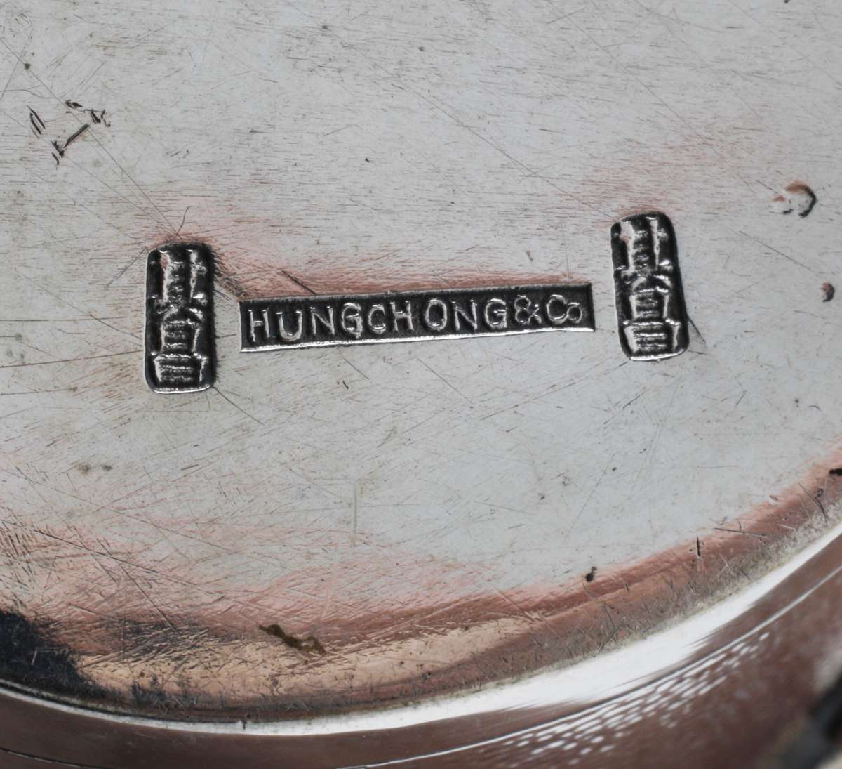 Hallmarks on the tea caddy base Hallmarks on the tea caddy base
