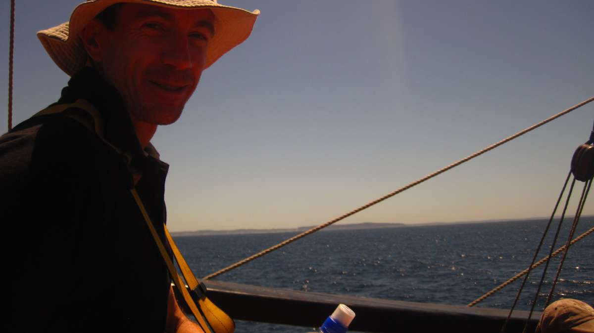 Dave sitting up on the quarterdeck watching the world go by