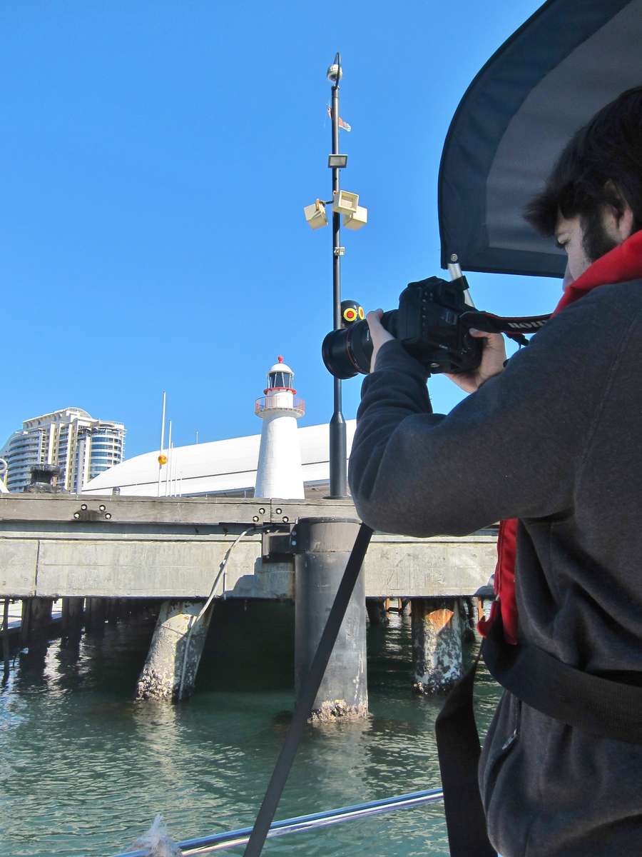 Elias filming from the boat