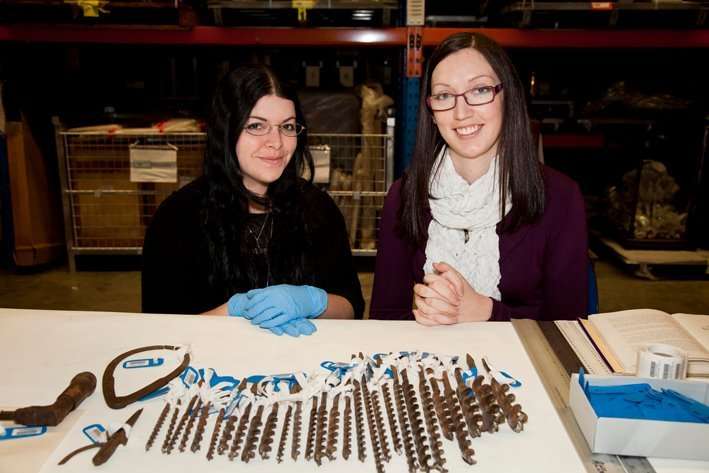 Interns with shipwright tools