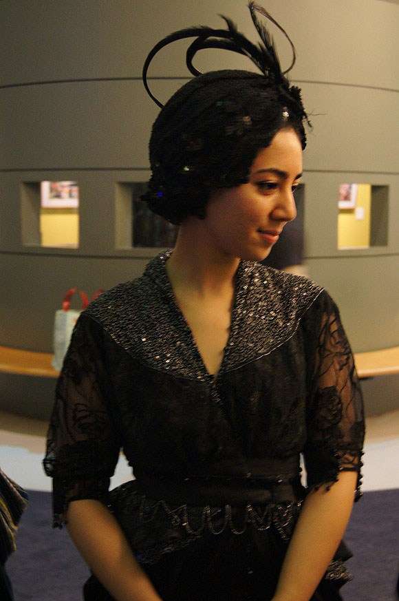 Portrait of model wearing black evening gown