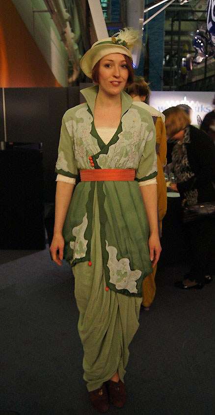 Portrait of a woman wearing a green gown