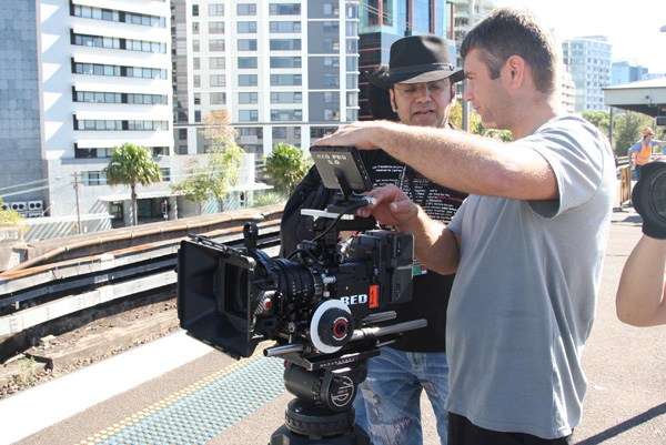 Director Anupam Sharma and Director of Photography Caz Dickson at Milsons Point, filming first Indian female train driver