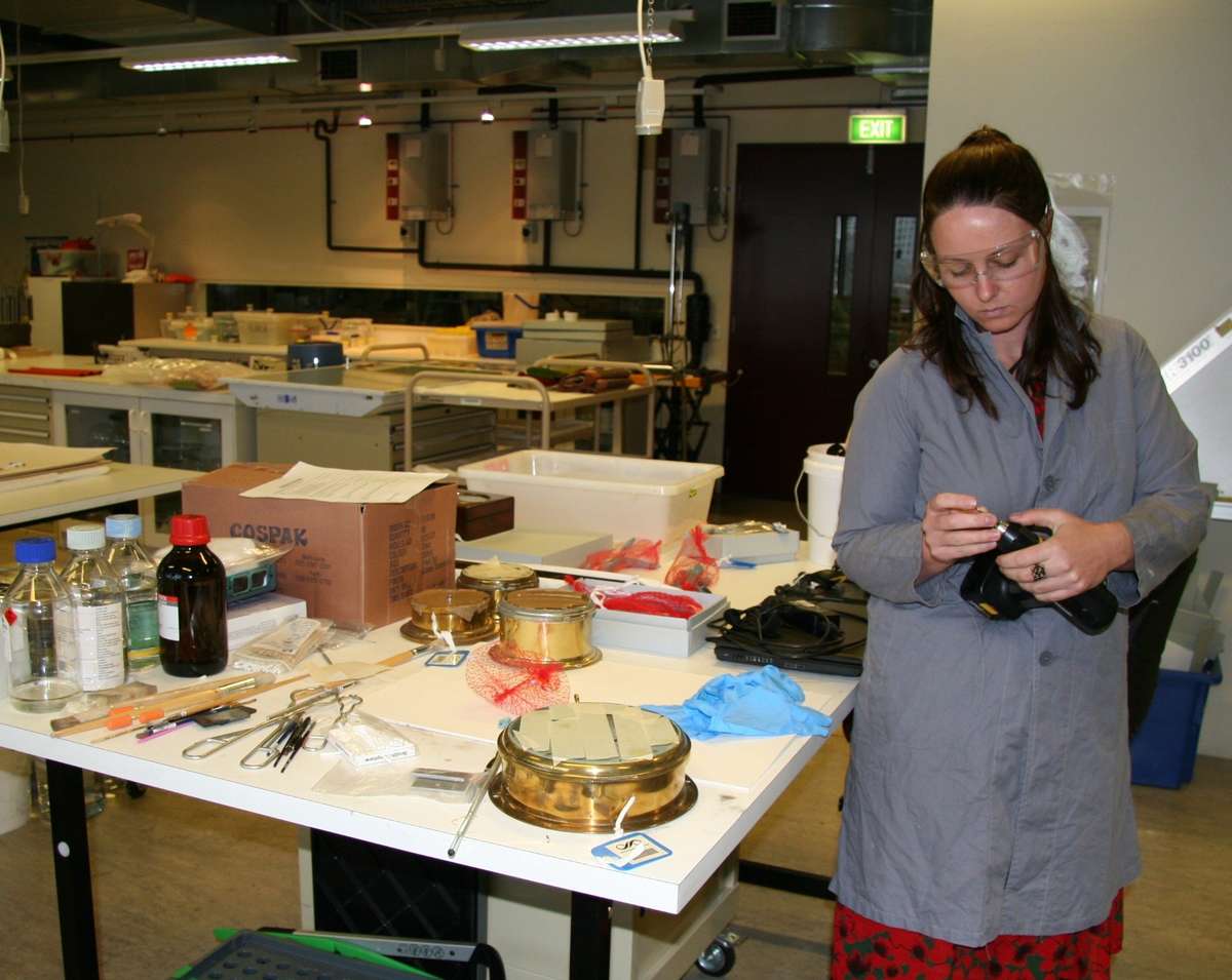 Preparing to drill a small exploratory hole into the Sirius anchor, as part of the conservation assessment process.
