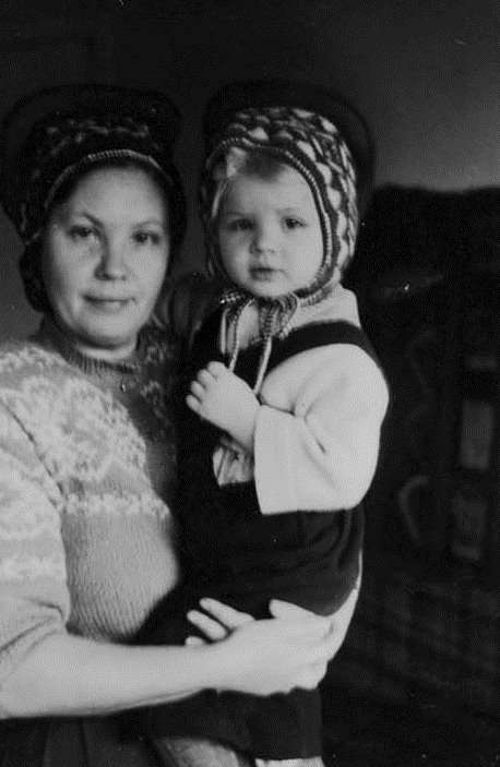 Magda and Anu Mihkelson wearing knitted hats in Sweden, 1948