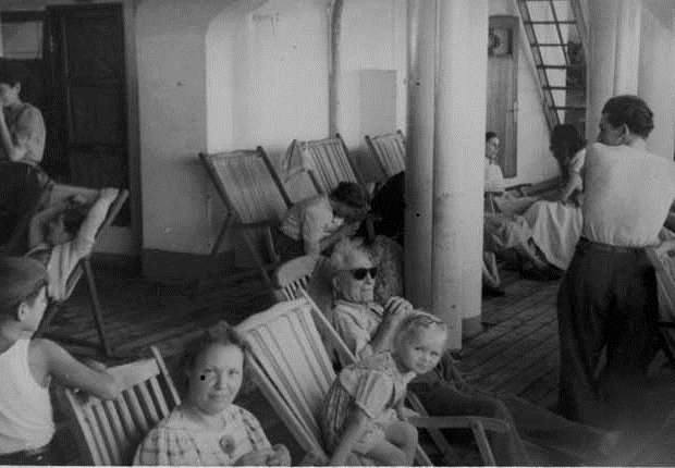 Magda knitting beside Anu on Toscana en route to Australia, 1948