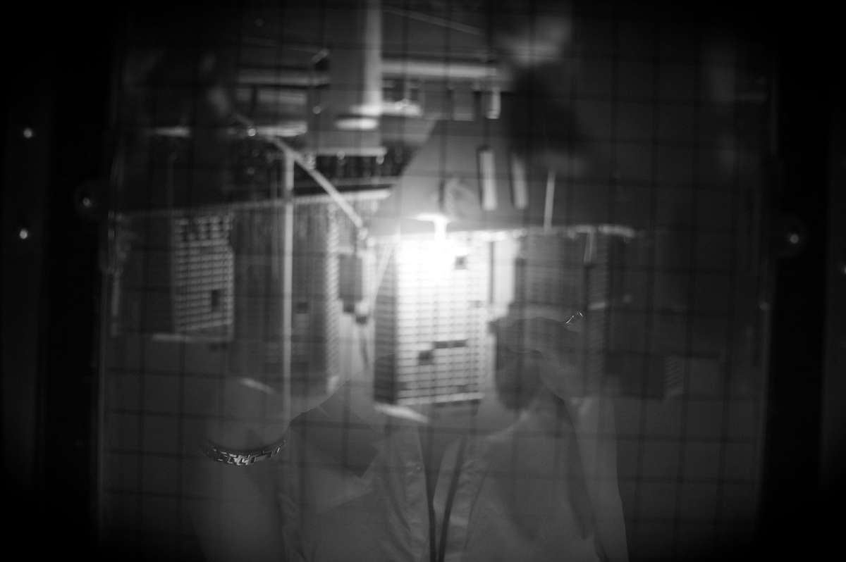 The view from under the cloth through the lens of an 8 x 10 deardorff camera. Upside down and back to front.