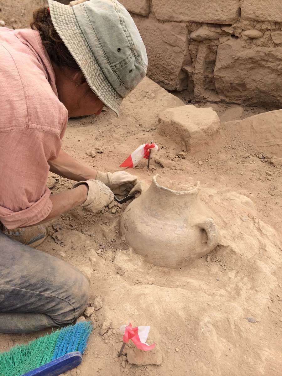 Australian archaeologist Dr Alexandra Ariotti working to remove a large storage jar at Khirbat ash-Shaykh ‘Īsā. Photo: Penny Hyde 2013