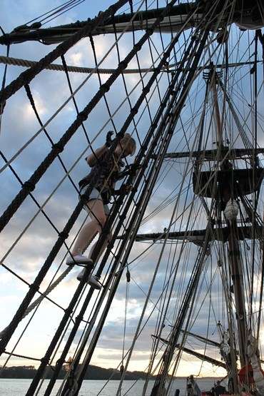 Voyage crew member Rachel descends from her first climb in Endeavour