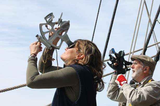 Third mate Penny and supernumerary Bill measure the angle of the sun at its zenith. Photo: Eden Alley-Porter.