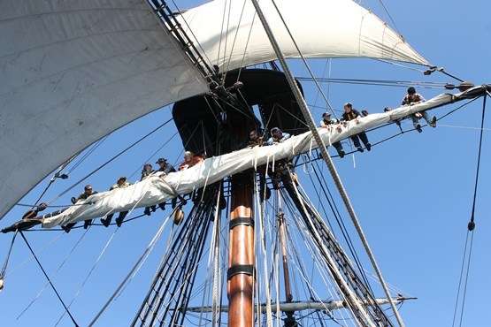 Furling the forecourse. Photo: EAP.