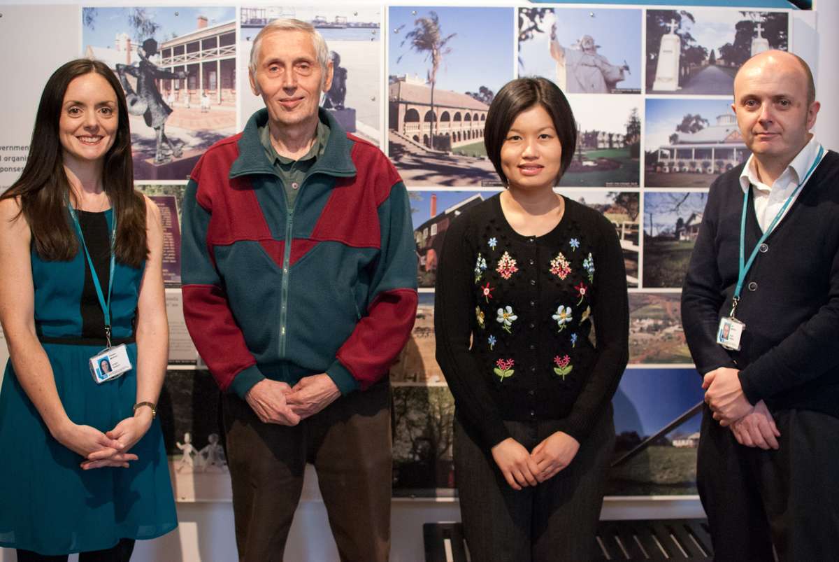 Former child migrant Tony Chambers (second from left) with Merseyside curator Ellie Moffat, ANMM curator Kim Tao and Merseyside deputy head Ian Murphy in Liverpool, 2014