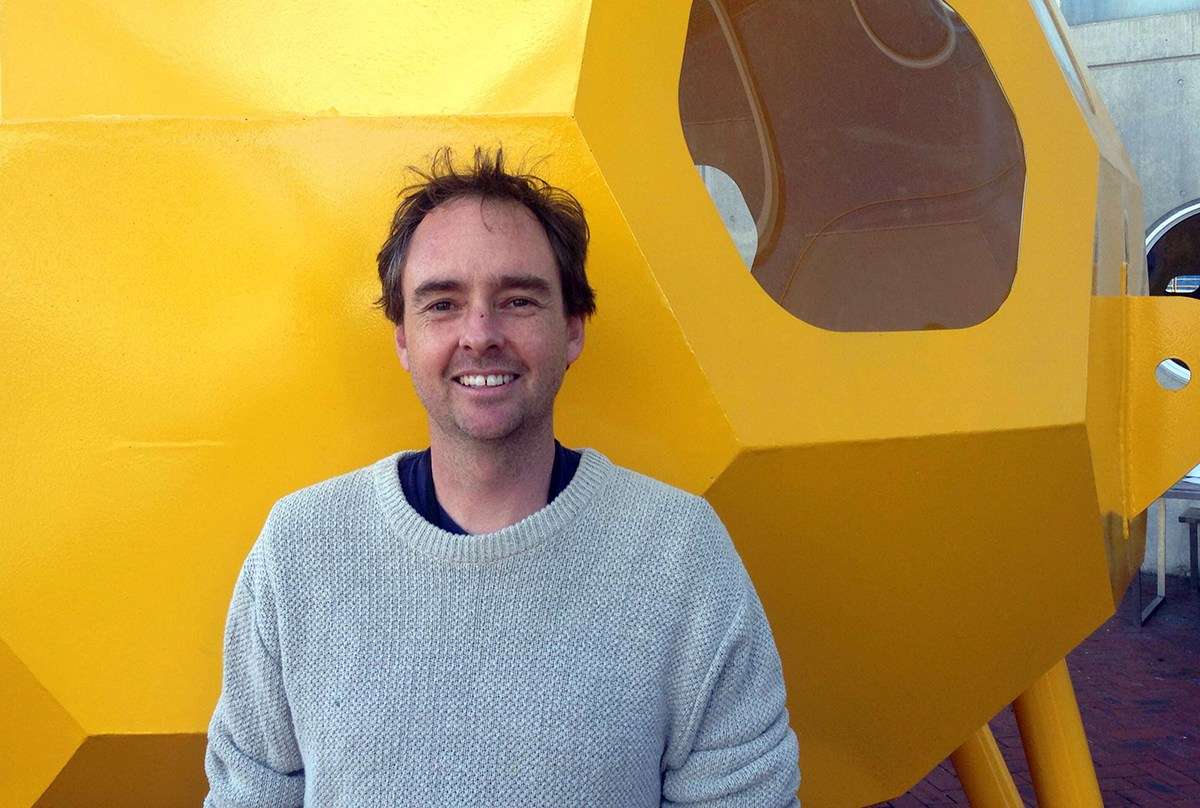 Lloyd Godson standing in front of the underwater habitat, 17 September 2015