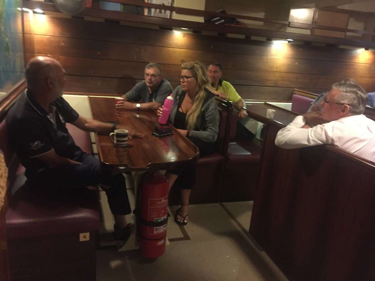 Holding court below deck.