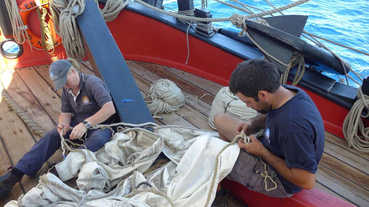 Sail repairs. Image: Derek Ryan.