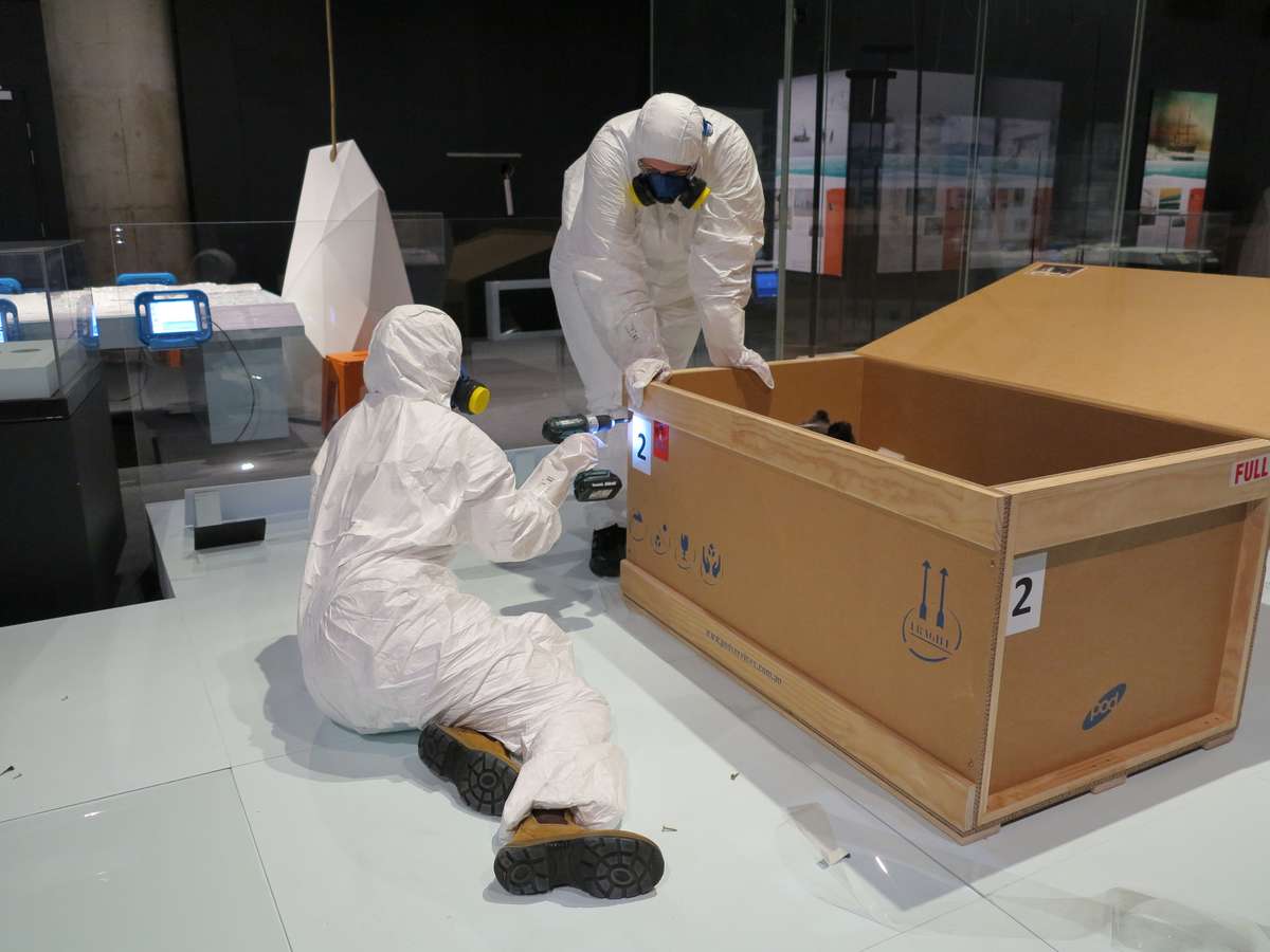 Closing the crates. Image: Kate Pentecost / ANMM.