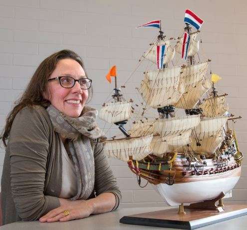 Dr Wendy van Duivenvoorde with a model of Batavia. © Flinders University